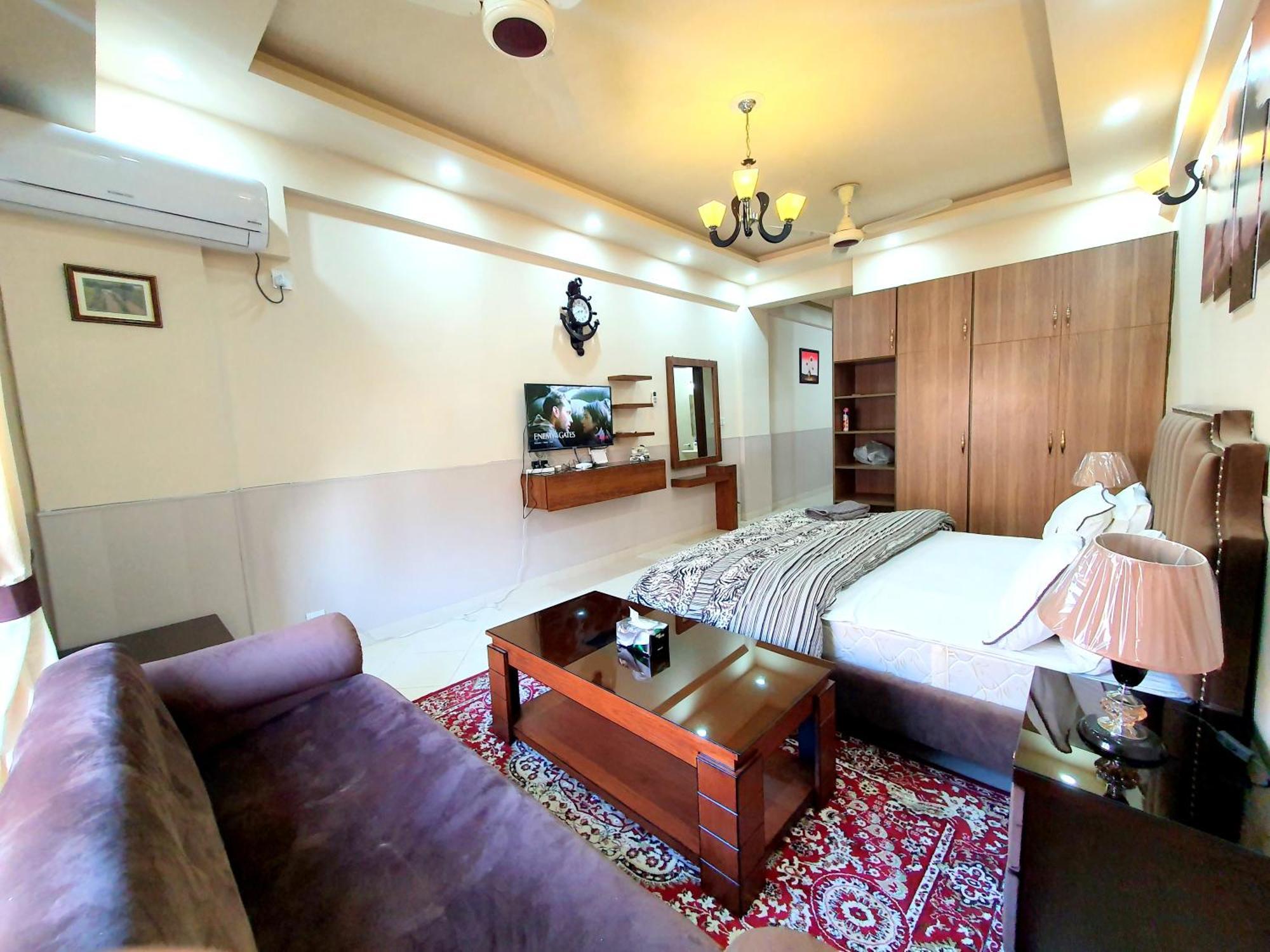 Luxurious Landing Apartments & Suites Bahria Town Rawalpindi Oda fotoğraf